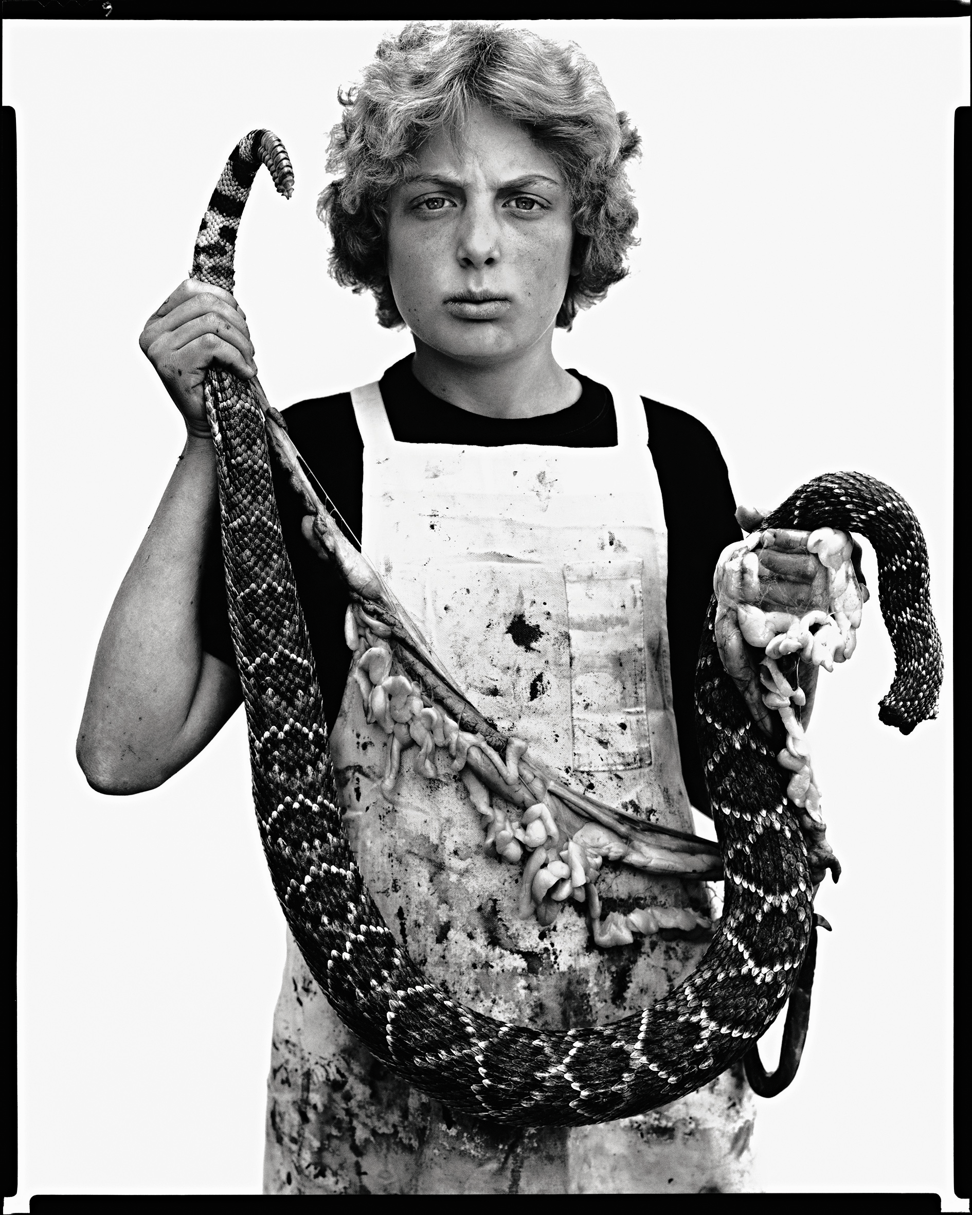 101 Boyd Fortin, thirteen year old rattlesnake skinner, Sweetwater, Texas, March 10, 1979. RICHARD AVEDON 101 Boyd Fortin, thirteen year old rattlesnake skinner, Sweetwater, Texas, March 10, 1979. RICHARD AVEDON
