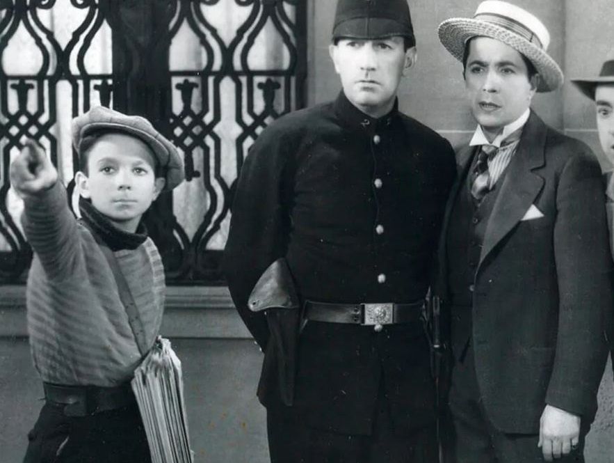 Astor Piazzolla (izquierda) y Carlos Gardel (derecha), en la película 'El día que me quieras', de 1935. PARAMOUNT 